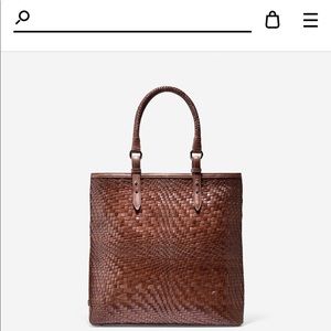 Leather tote comes with cloth duster bag